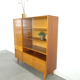 Vintage wooden sideboard with sliding glass doors and drawers