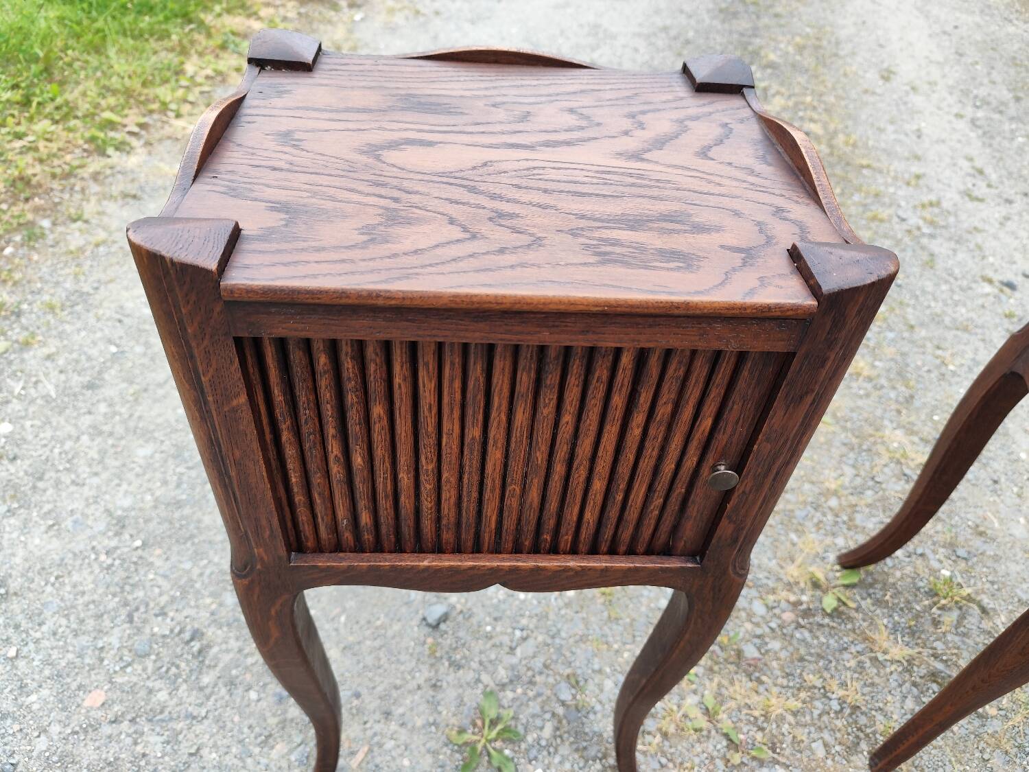 Pair of oak bedside tables with curtained niche doors