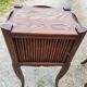 Pair of oak bedside tables with curtained niche doors