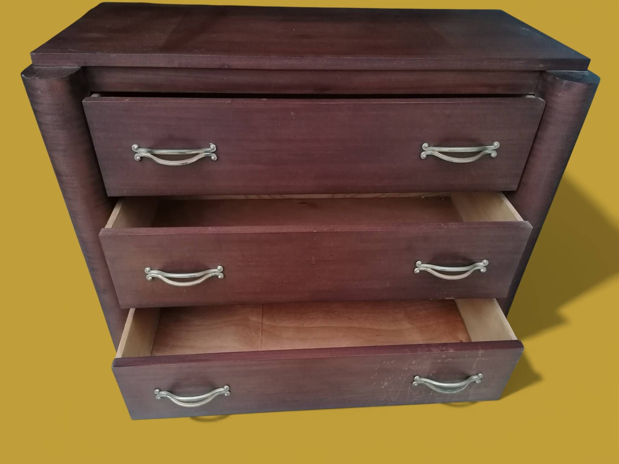 Small veneered wooden Art Deco chest of drawers.