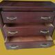 Small wooden veneer Art Deco chest of drawers.
