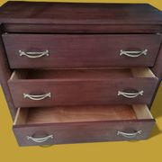 Small veneered wooden Art Deco chest of drawers.