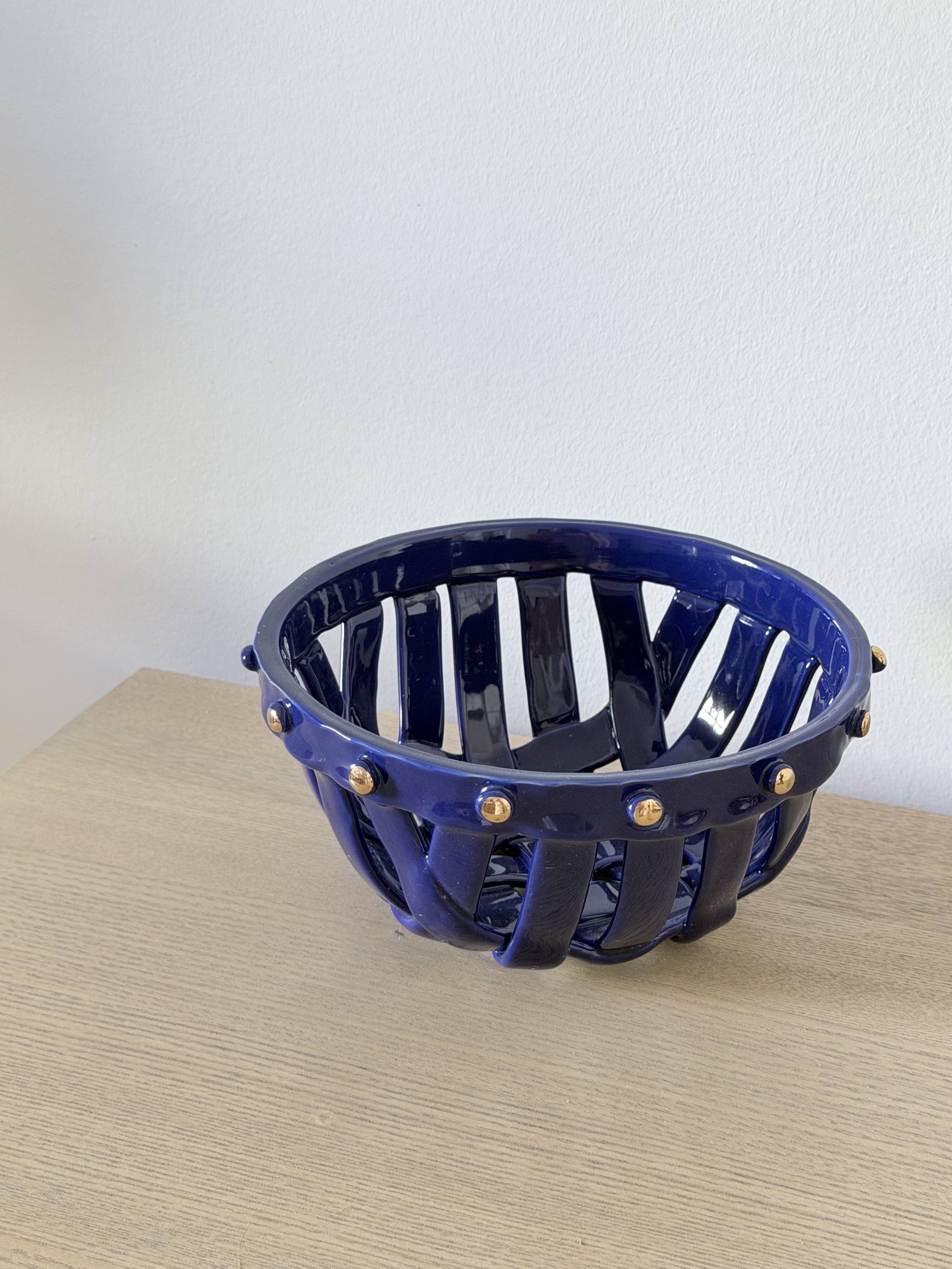 Large cobalt blue openwork bowl with golden studs