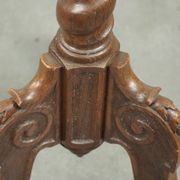 Antique tall oak plant/side table with wood carving and a turned leg