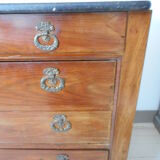 Old chest of drawers with black marble