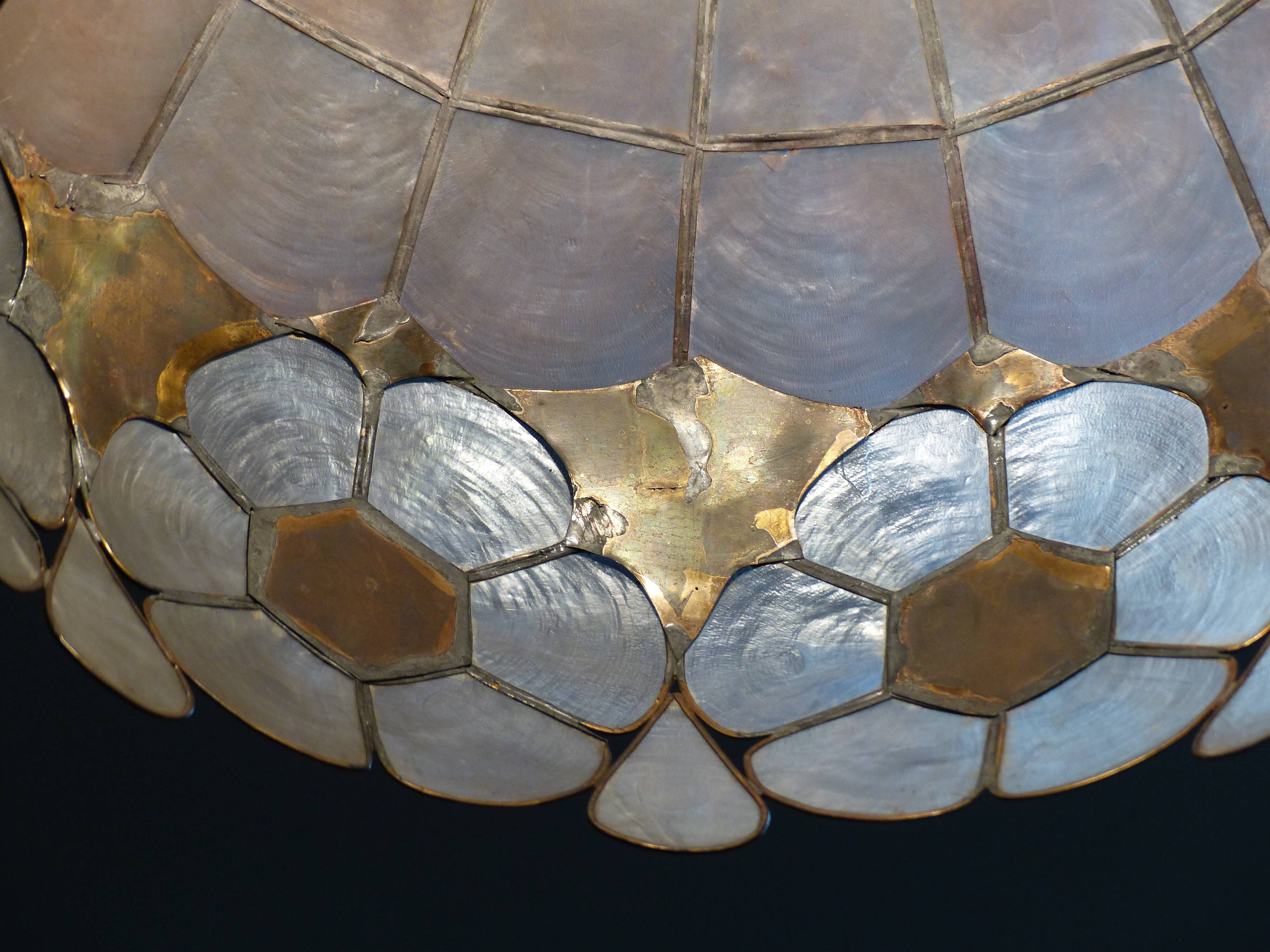 Colorful mother-of-pearl chandelier and brass