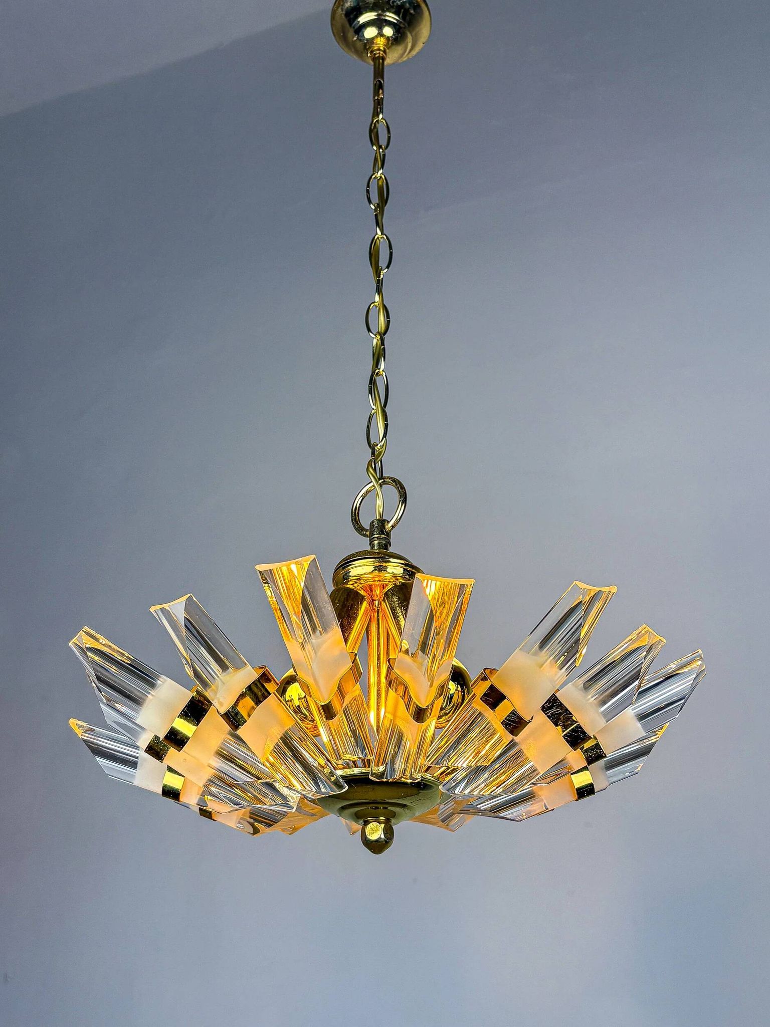 Sun-shaped chandelier by Oscar Torlasco for StilKronen, cut Murano glass, Italy 1970s