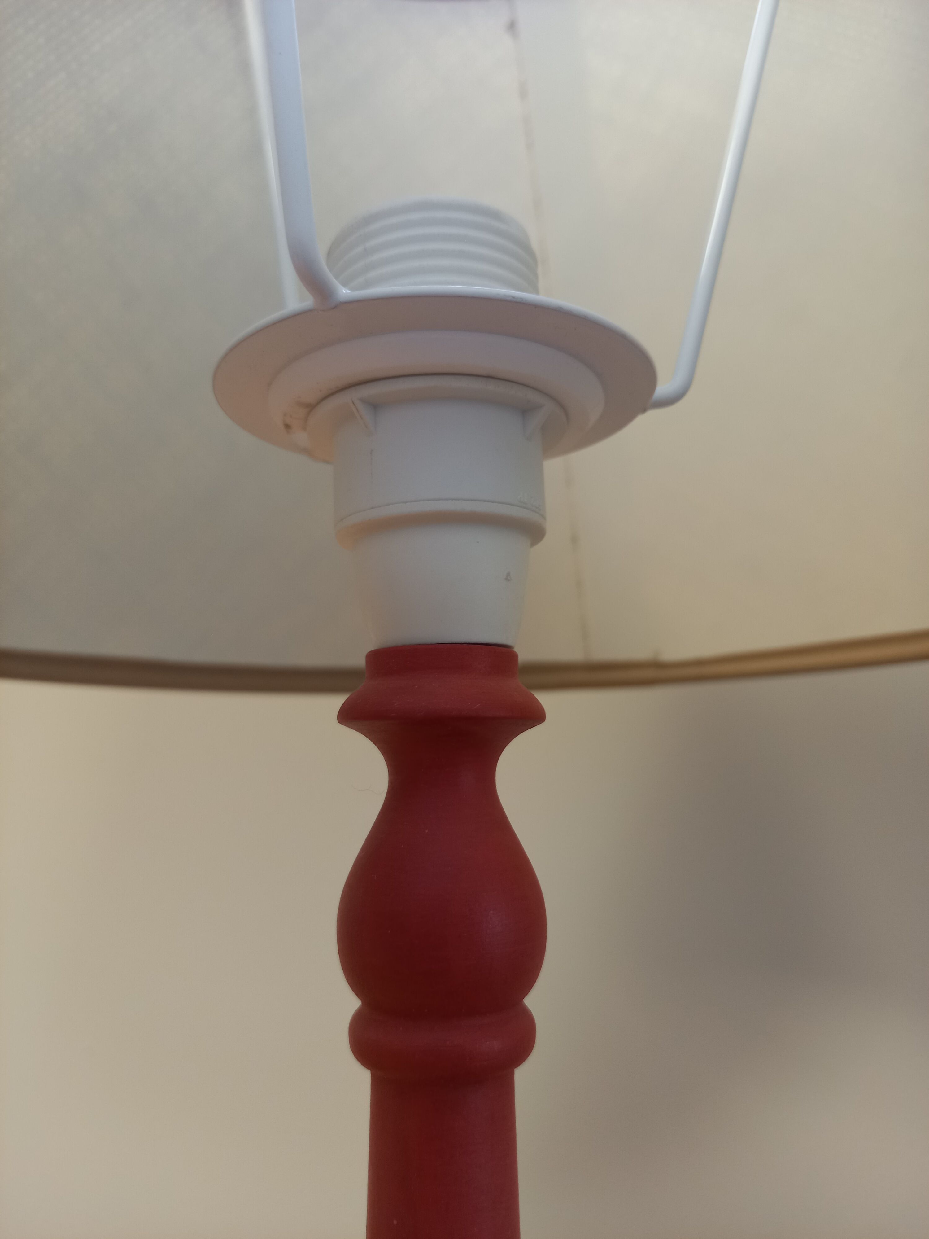 Red patinated wooden lamp
