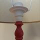 Red patinated wooden lamp