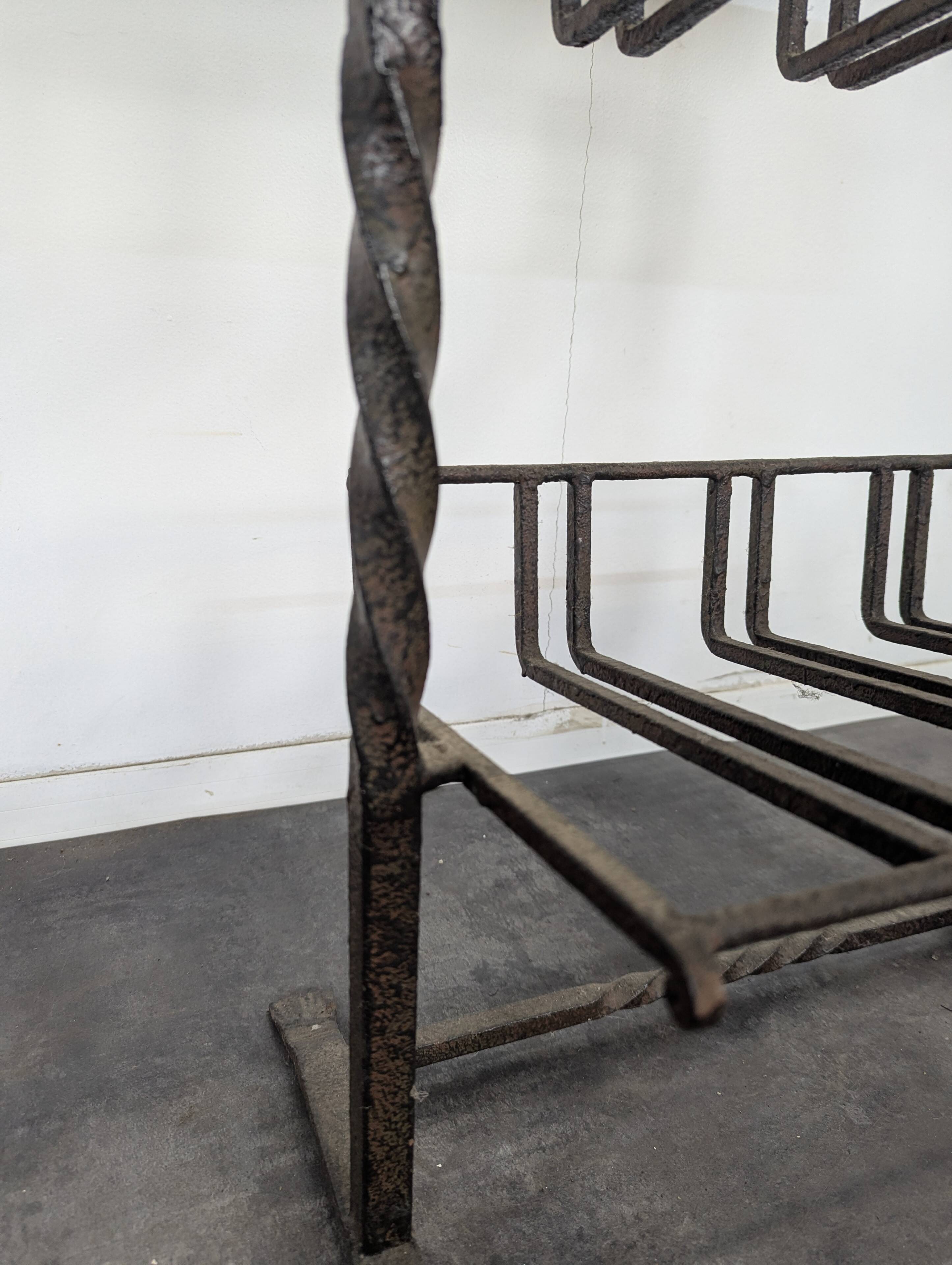 Brutalist magazine rack in wrought iron and oak