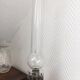Old-fashioned brass standing oil lamp