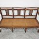 Directoire canapé in walnut with brass inlays, late 18th century.