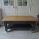 Coffee table on casters made from a vintage table, 1 drawer, 1 slate gray shelf.