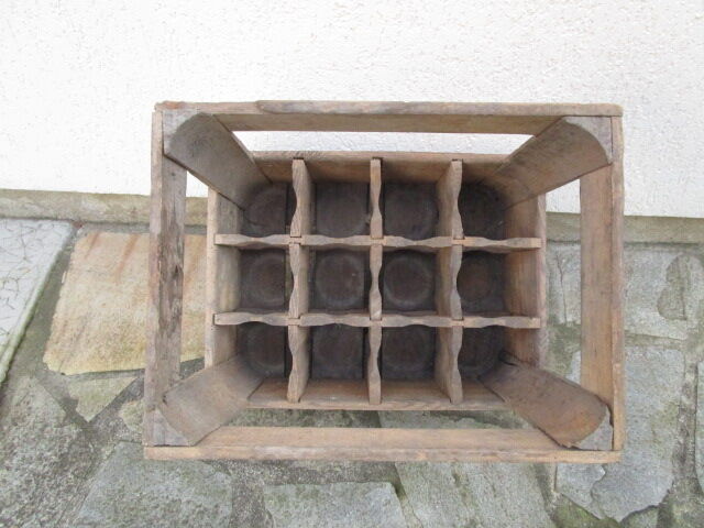 Former wooden bottle crate advertising