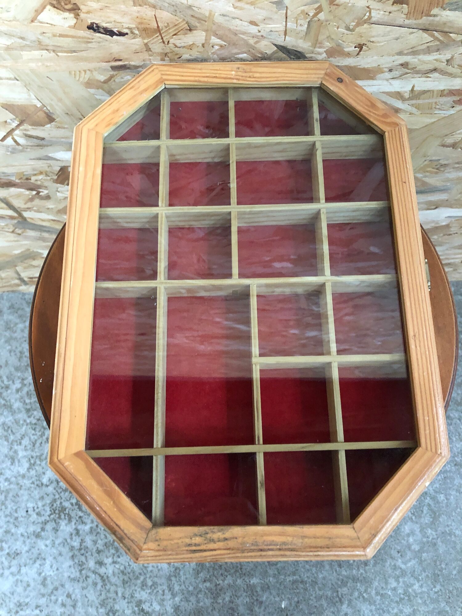 Old hanging showcase 22 wooden boxes red background
