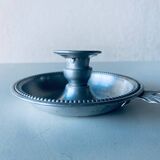 Old aluminum candle holder