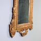 Antique carved and gilded wooden mirror, Italy, early 20th century.