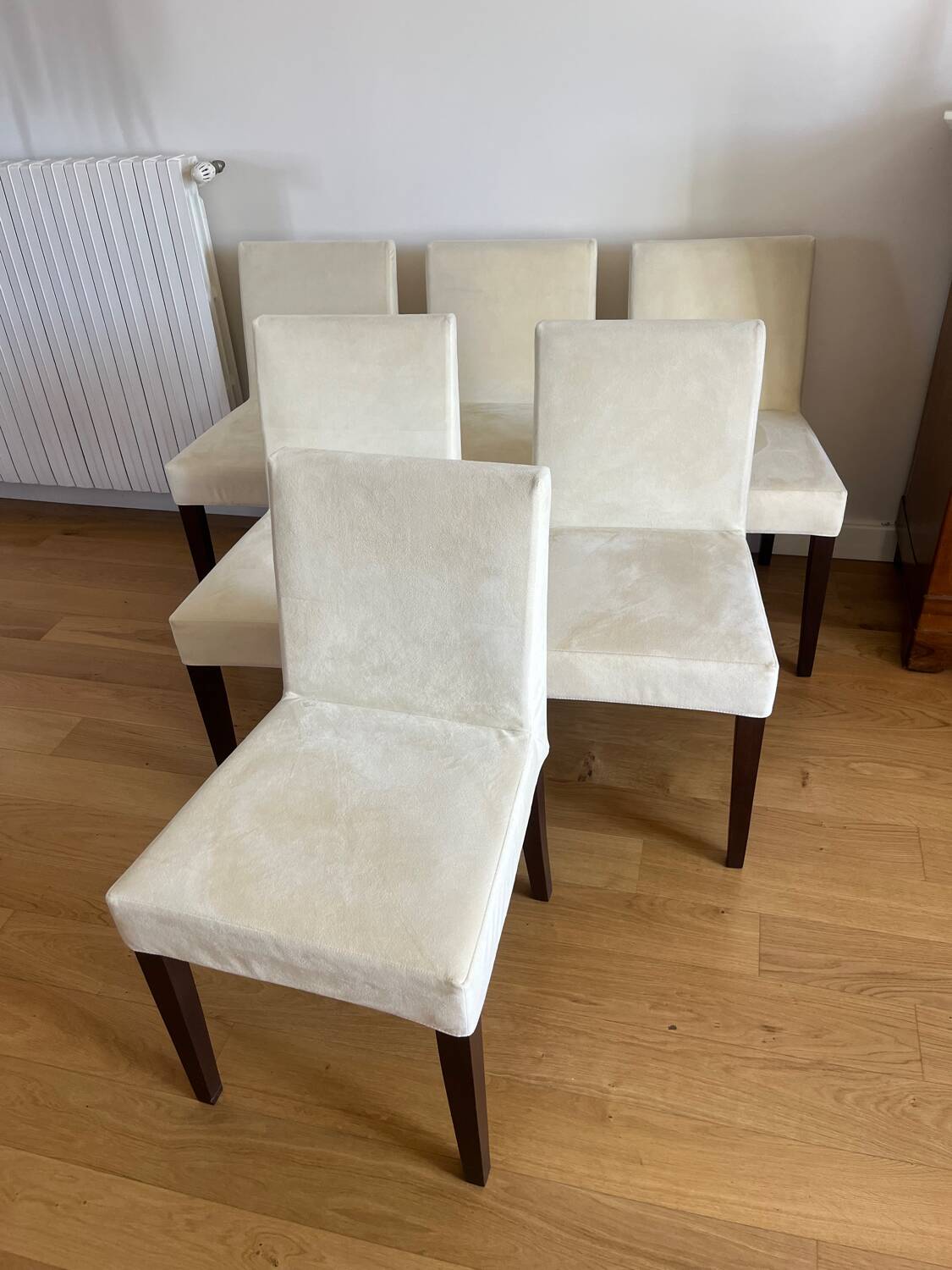 6 Ligne Roset chairs in ivory alcantara.