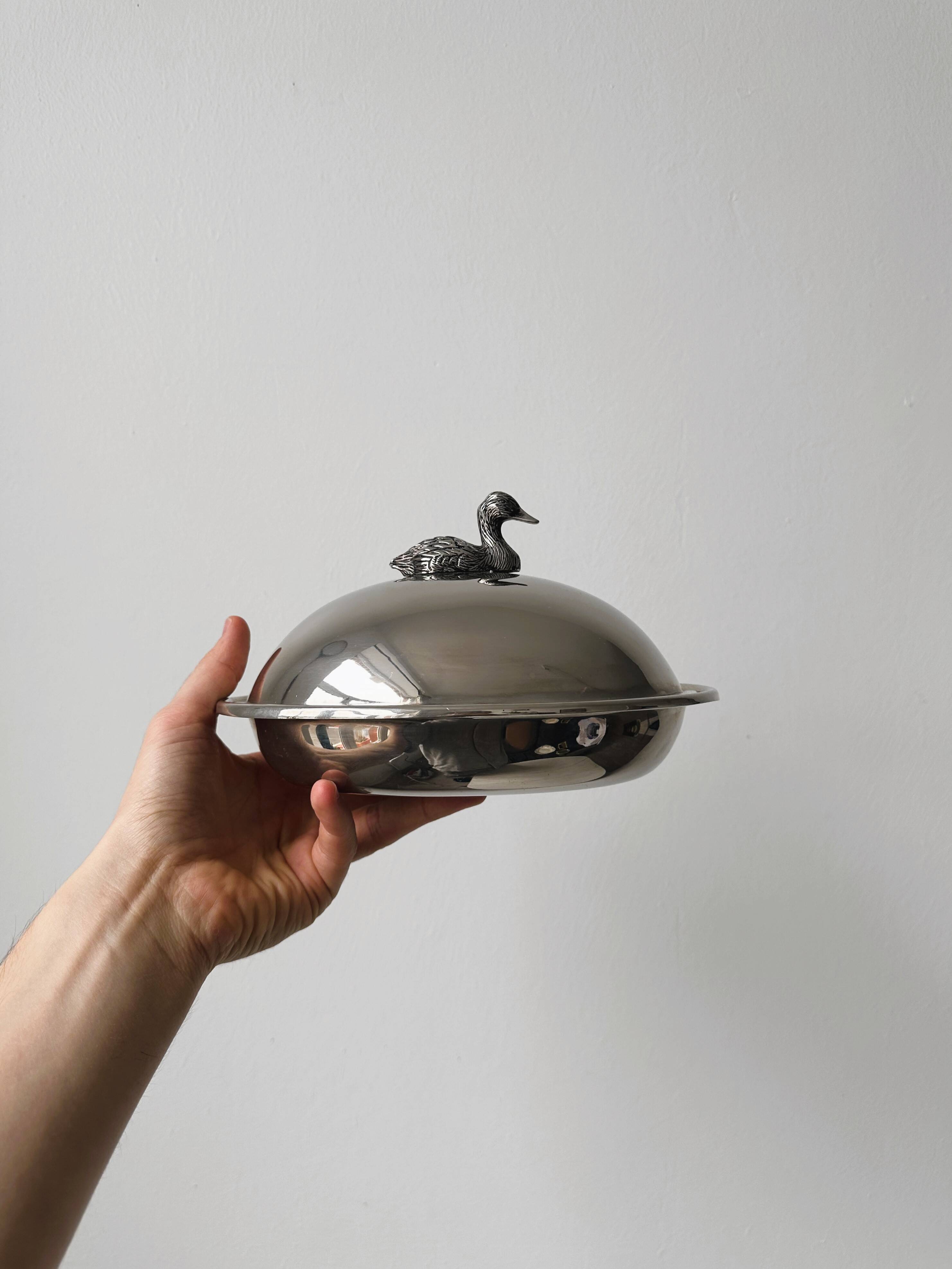Foie gras display in stainless steel and silver metal.