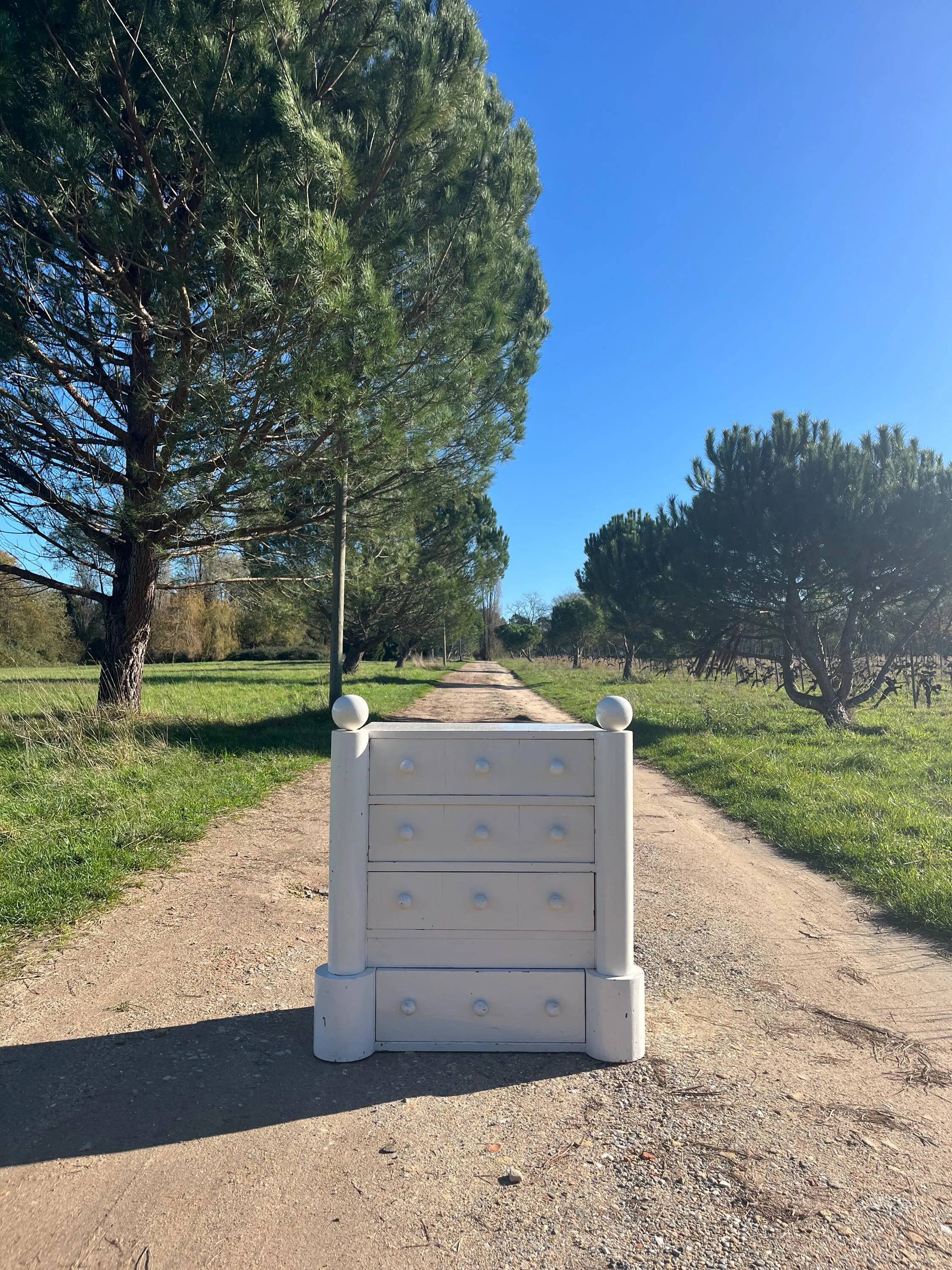 1950s lacquered wood chest of drawers