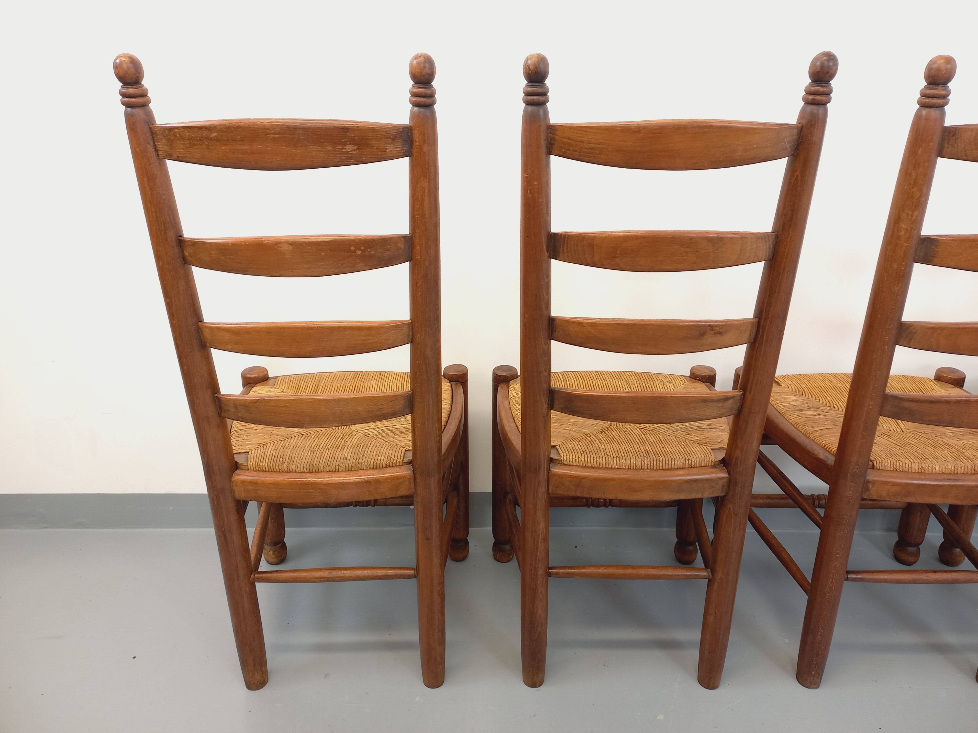 Set of 4 vintage brutalist Charles Dudouyt chairs in wood and straw from the 60s