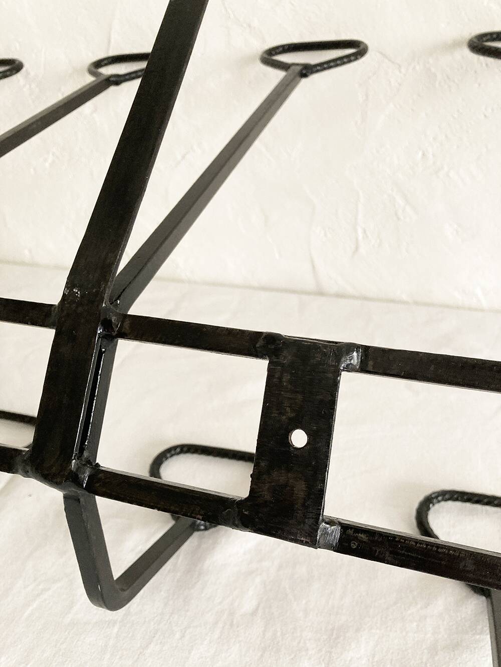Wall-mounted coat rack with 12 hooks in handcrafted wrought iron