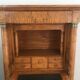 Empire-style secretary desk in burr walnut with detached columns, drop-front, and secret drawer