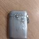 Antique match holder with striker in silver