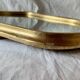 Antique beveled wall mirror in gilded solid wood