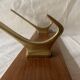 Vintage wooden wall-mounted coat rack with 3 golden cast aluminum hooks