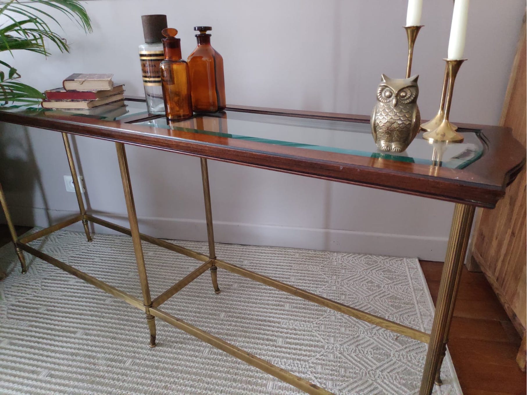 Glass and brass console table