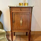 Antique bedside table in wood and marble – adorned with gilded brass ornaments –