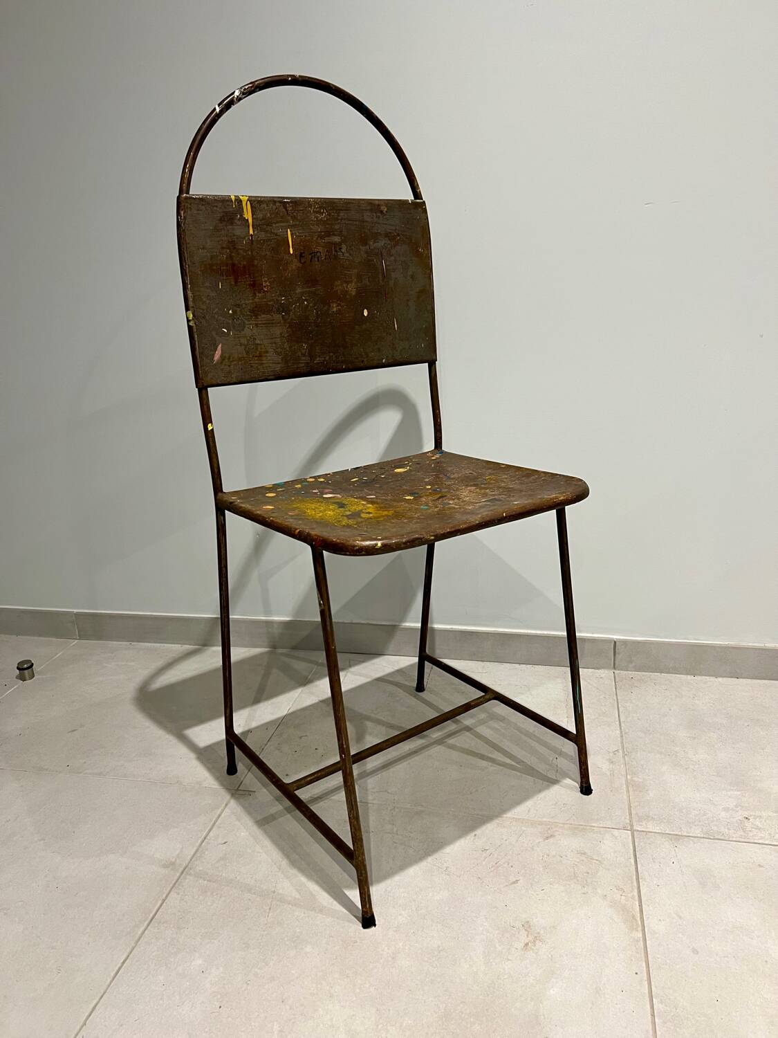 Pair of vintage raw metal chairs