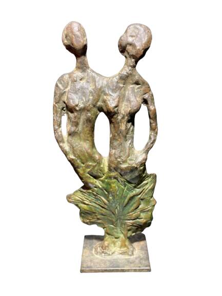 Sculpture of a man and a woman in spelter, signed Patsoglou