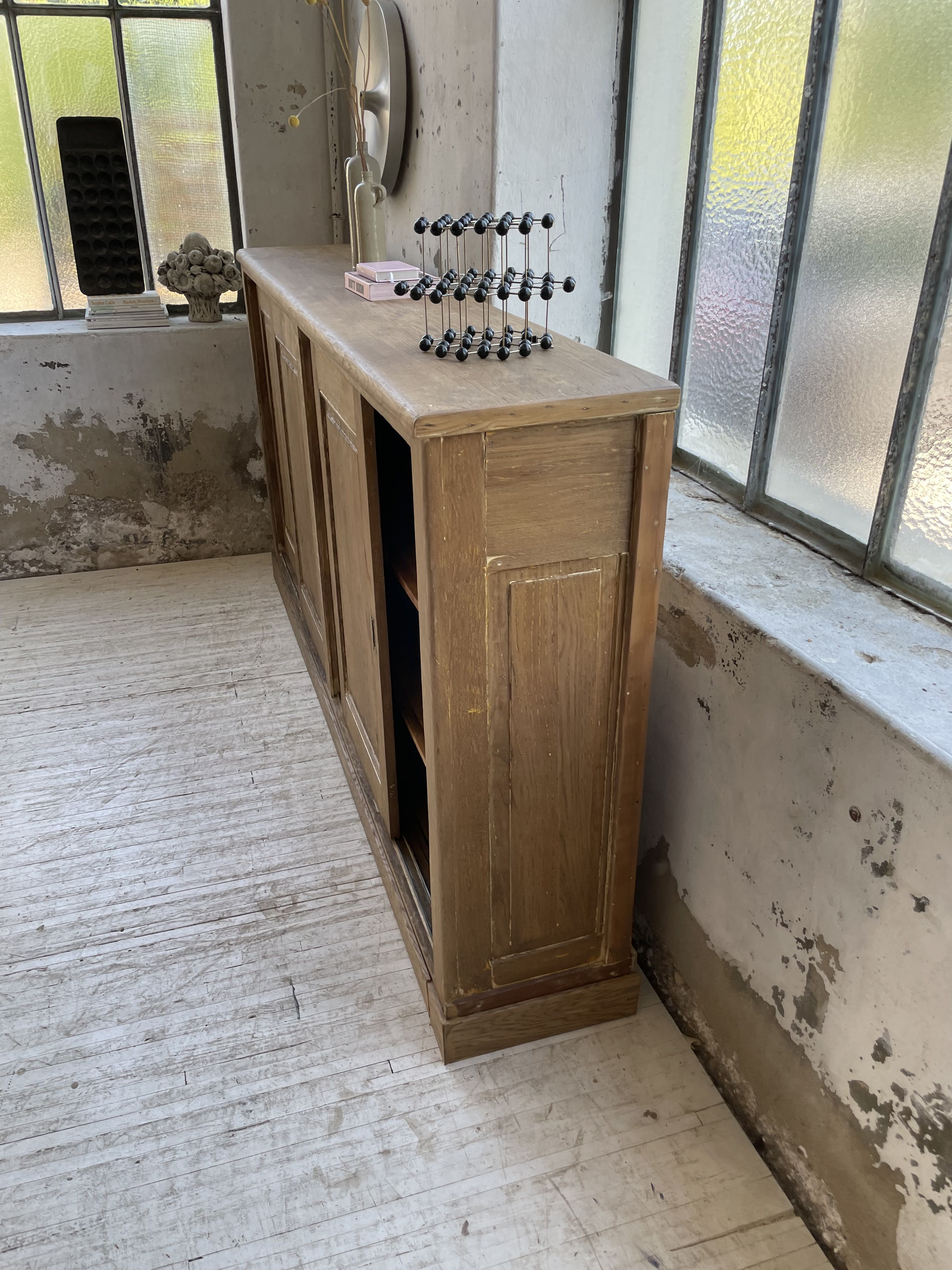 Large row of solid oak loom sliding doors