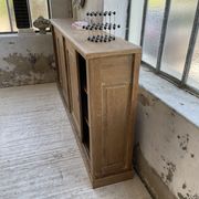 Large row of solid oak loom sliding doors