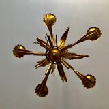 Golden suspension 5 fires with a bouquet of ears of wheat