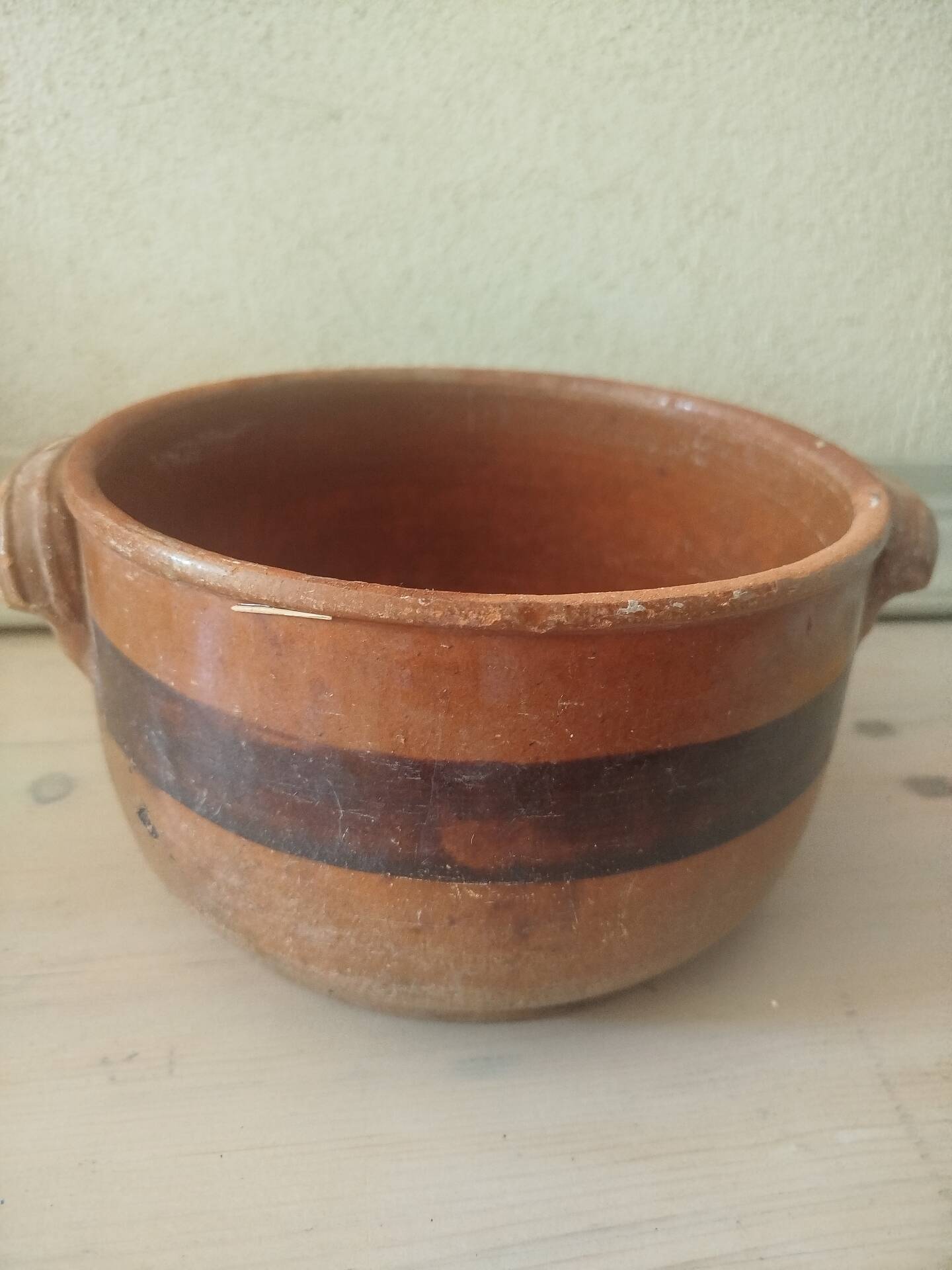 Old terracotta casserole