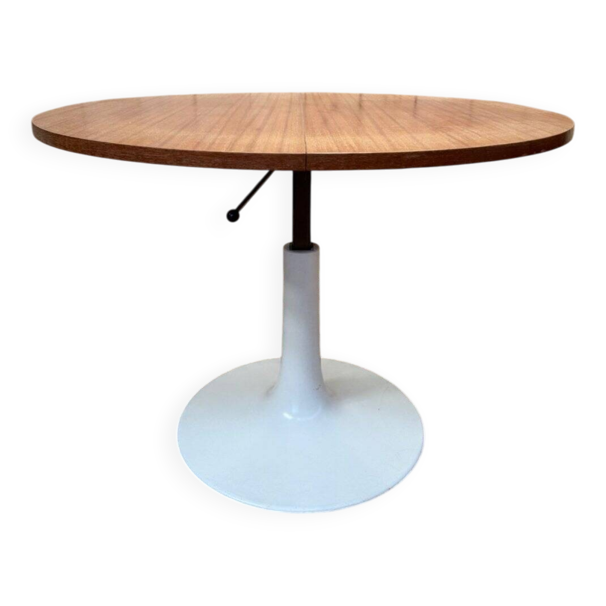 Round dining table with tulip base, 1960s design.