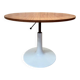 Round dining table with tulip base, 1960s design.
