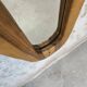 Vintage free-form mirror in solid wood.