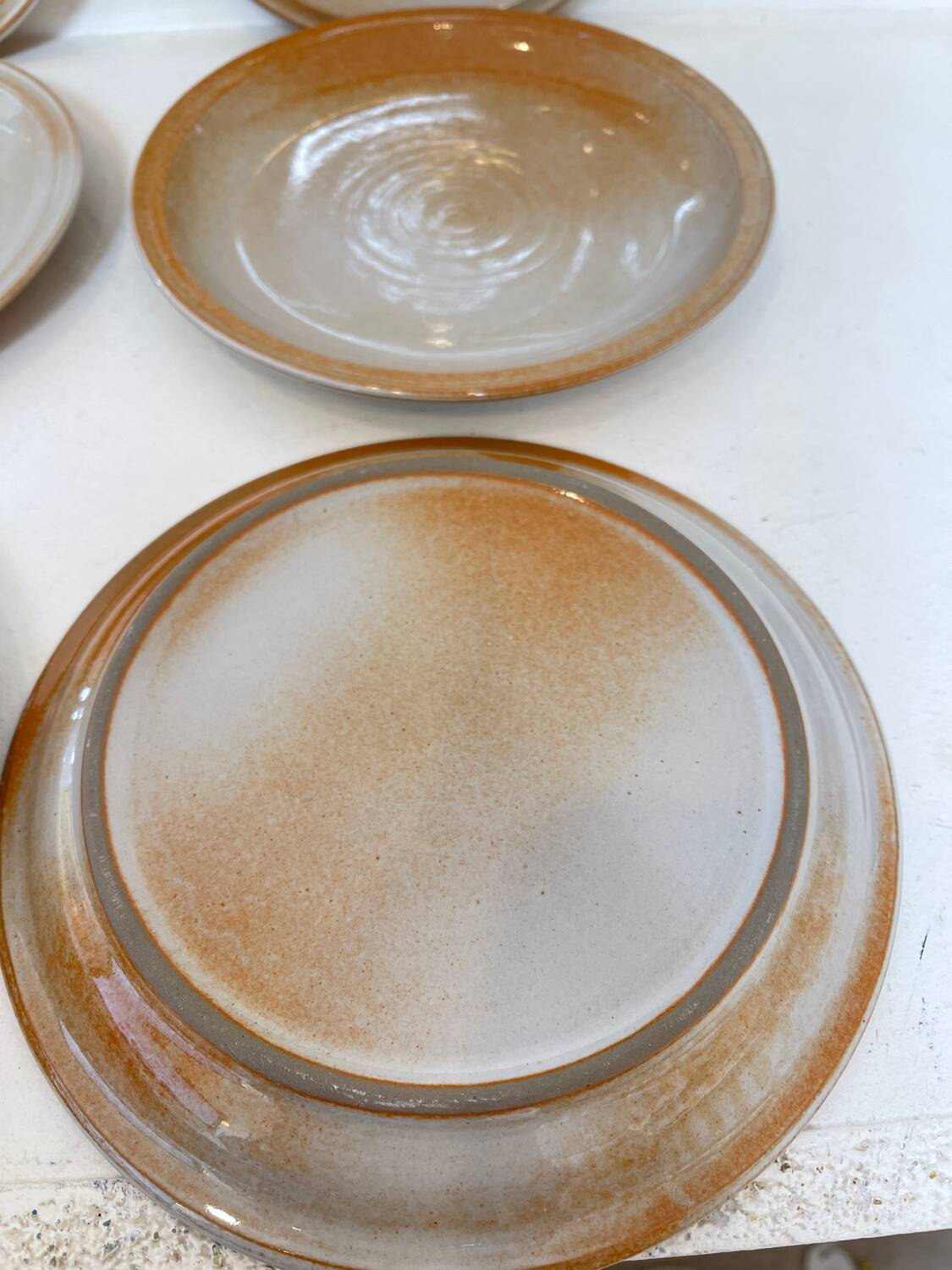 12 stoneware dessert plates, 1970