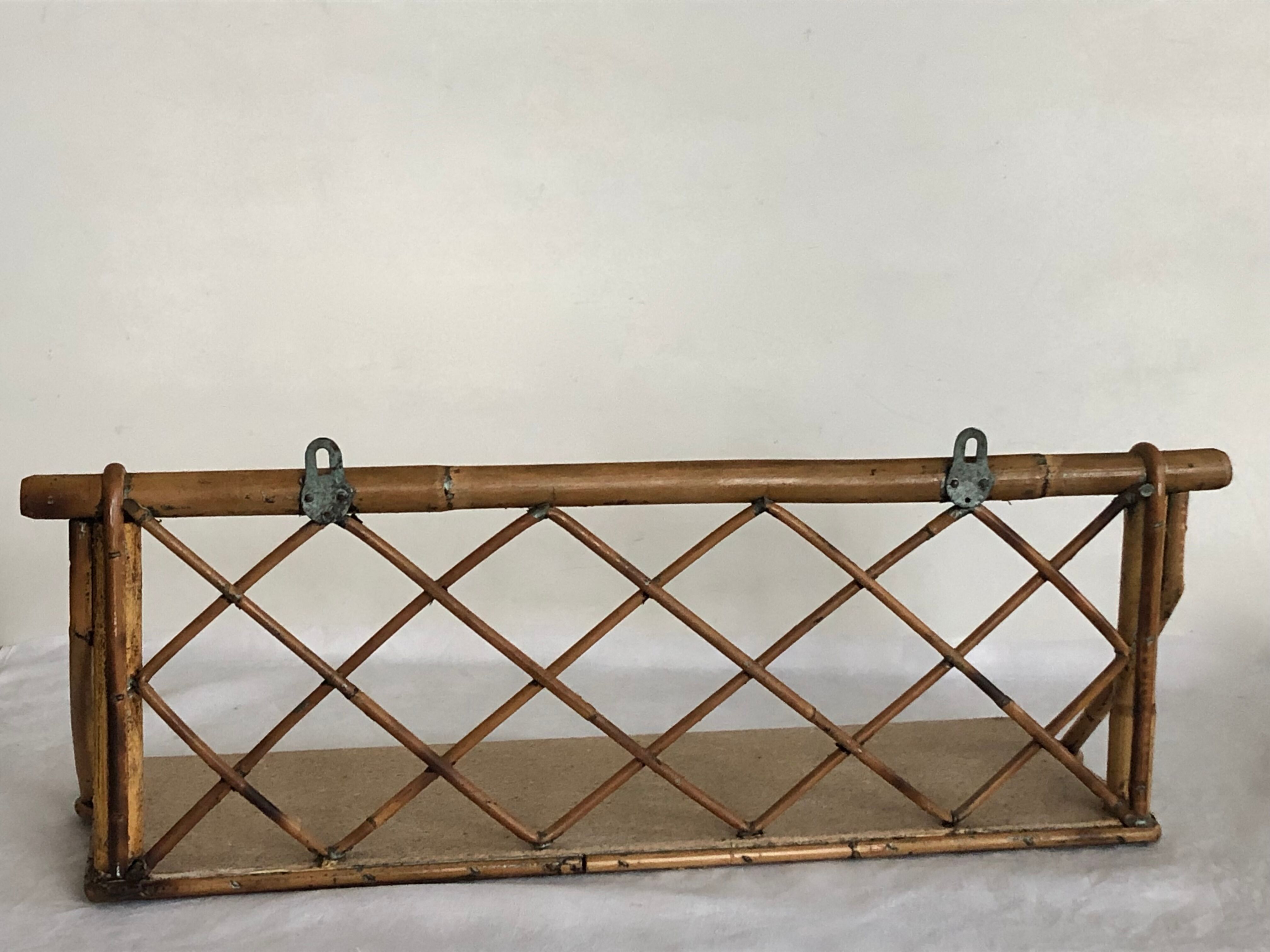 Rattan wall shelf, 50s
