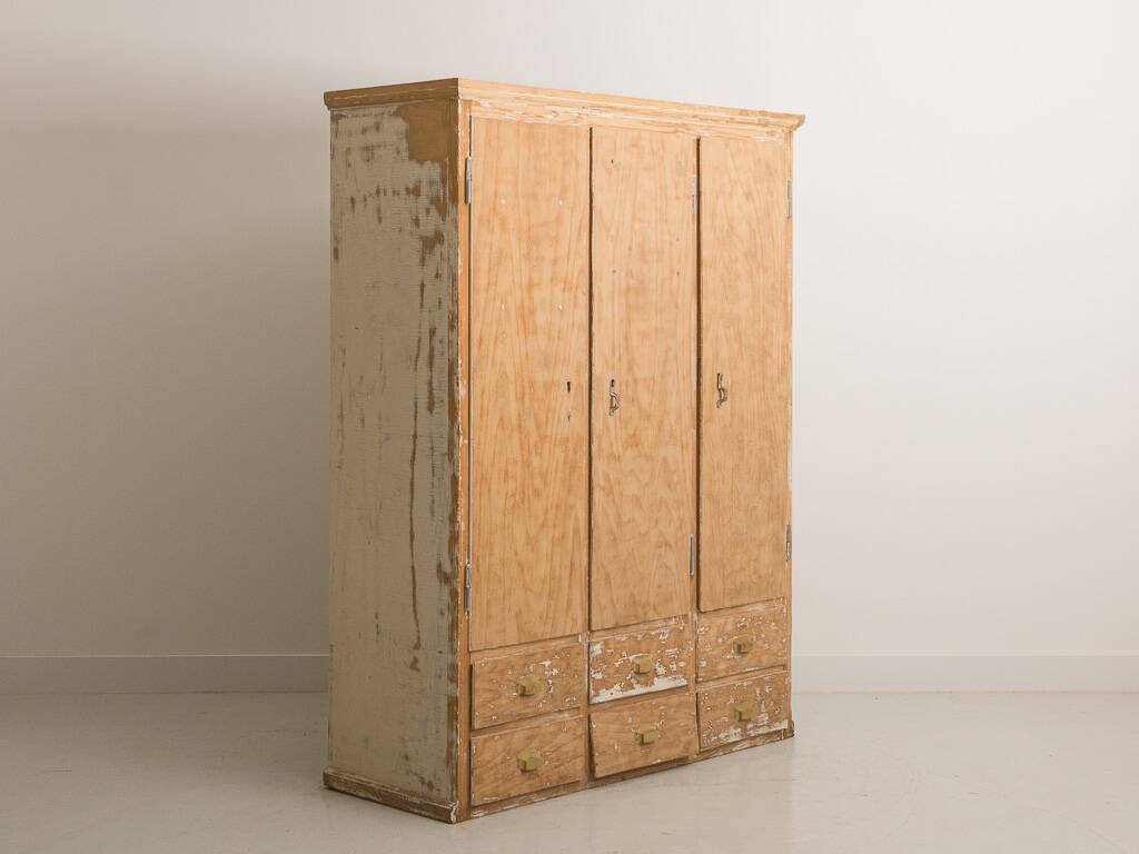 Solid pine cabinet fully stripped consisting of 3 doors and 6 drawers