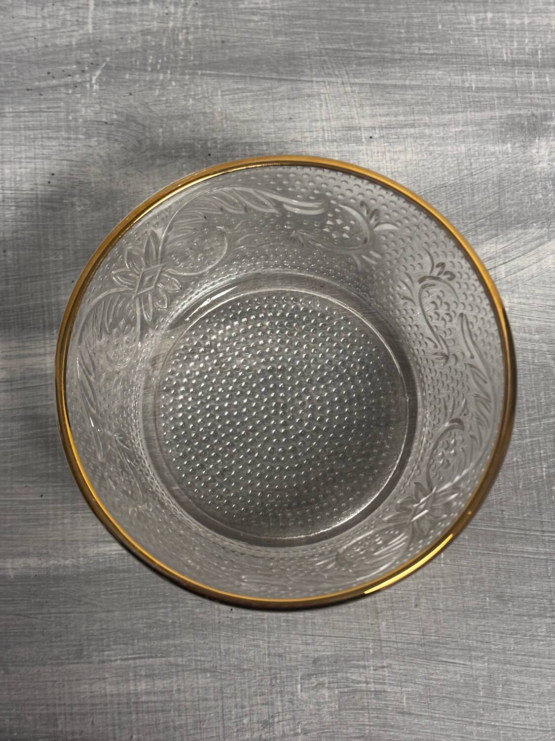 Set of 3 glass bowls with gold embellishments.