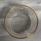 Set of 3 glass bowls with gold embellishments.