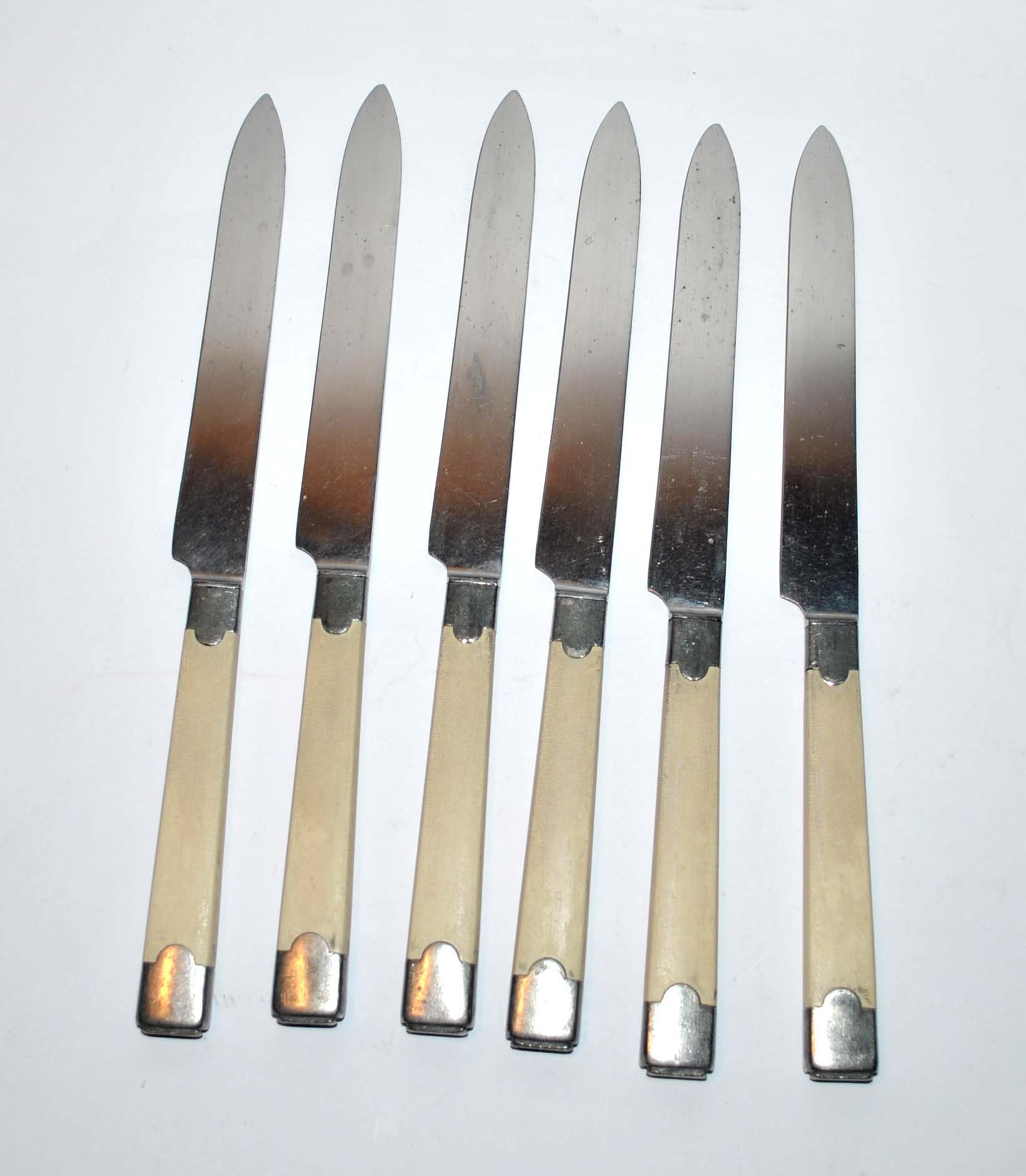 Series of 6 retro table knives in steel and ivory cracked lacquer 1940