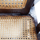 Art Deco armchairs in wood, with cane seat and backrest, circa 1930.