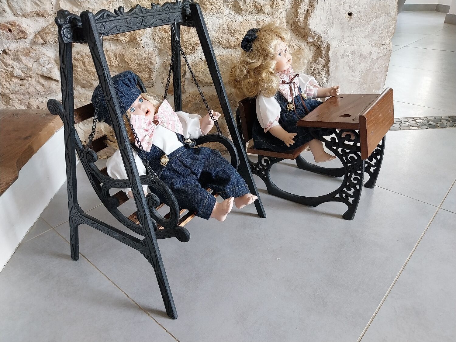 Wooden swing desk and porcelain dolls