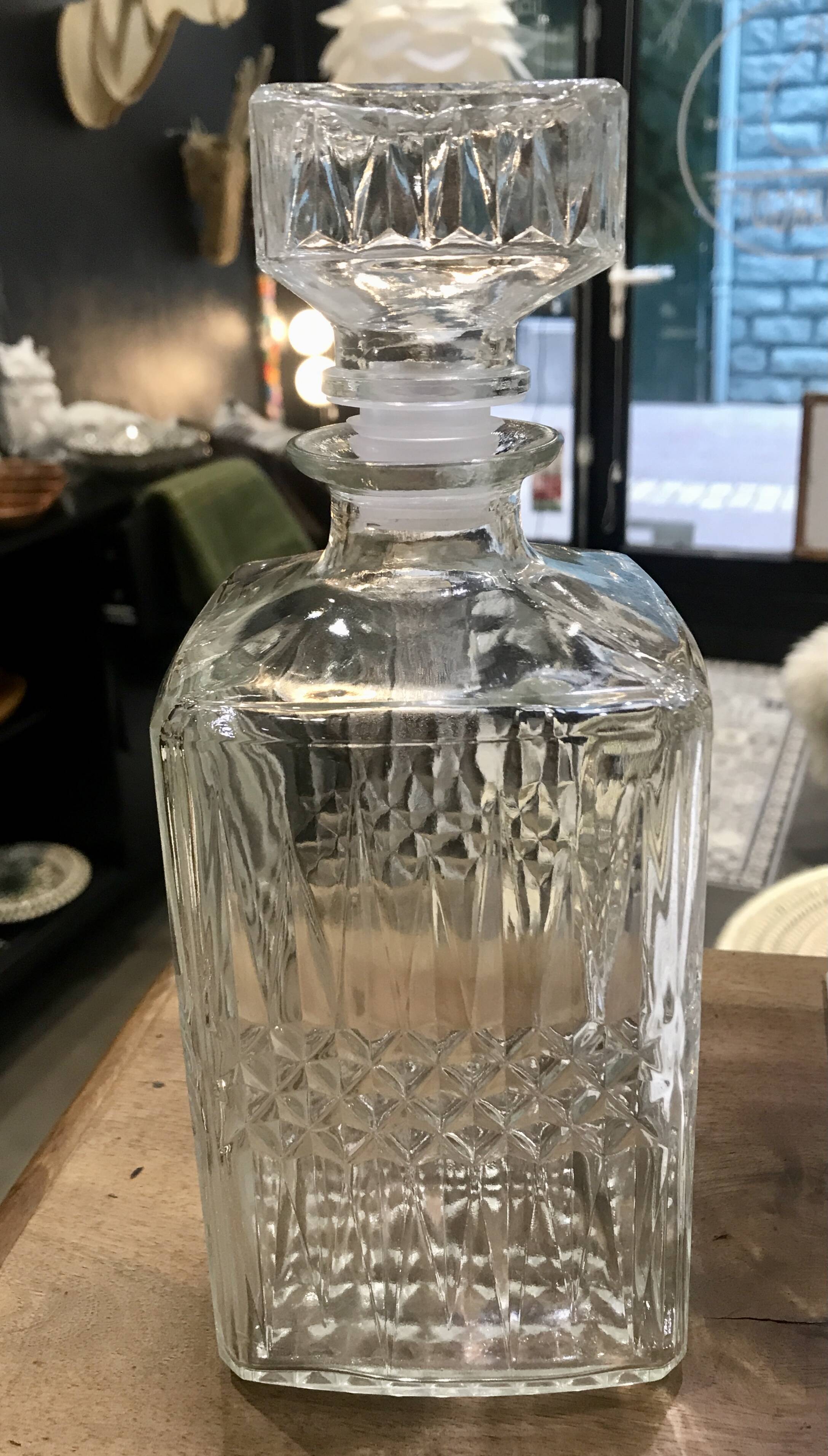 Vintage embossed glass whiskey decanter